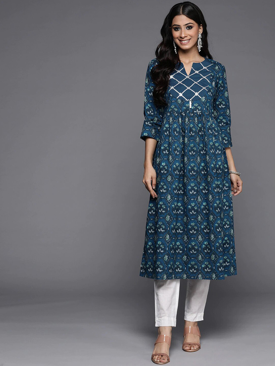 

Varanga Women Blue Ethnic Motifs Printed Thread Work Floral Kurta