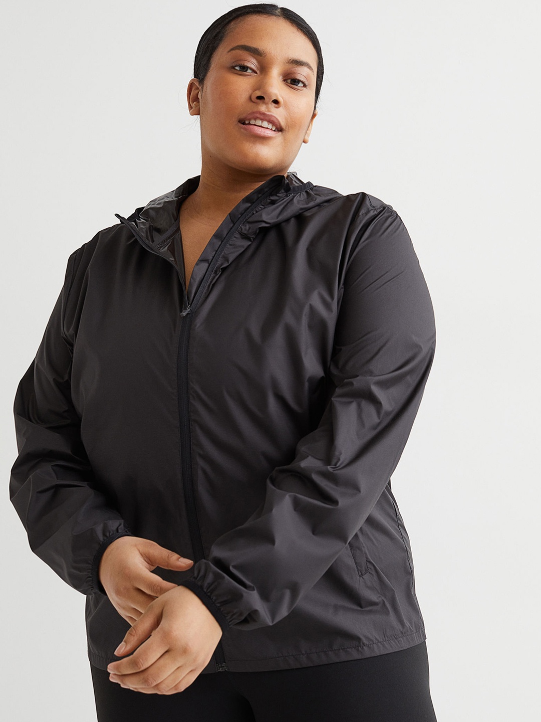 

H&M+ Women Black Solid Hooded Windbreaker