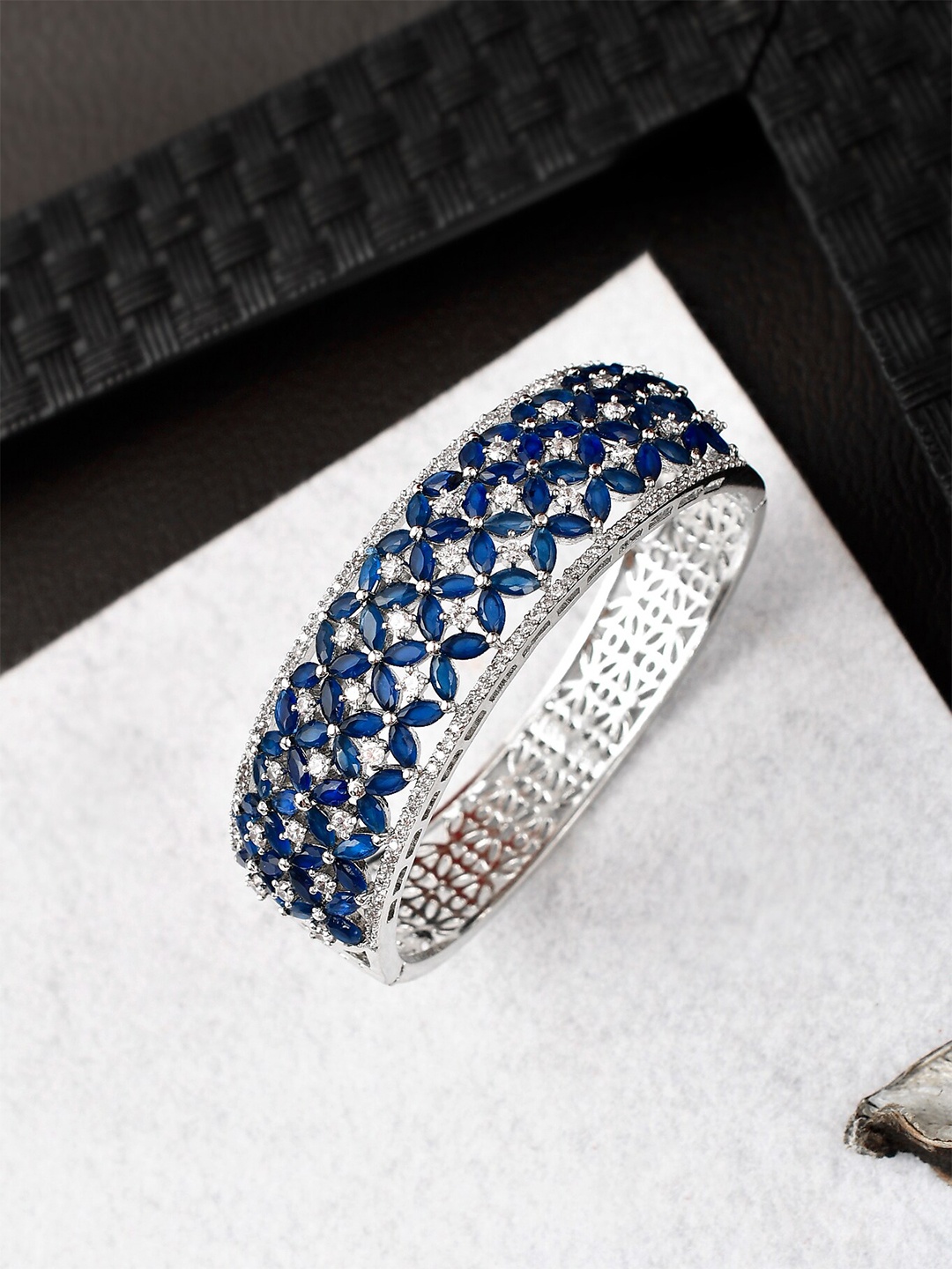 

Silvermerc Designs Women Silver-Toned & Blue Brass American Diamond Silver-Plated Bangle-Style Bracelet