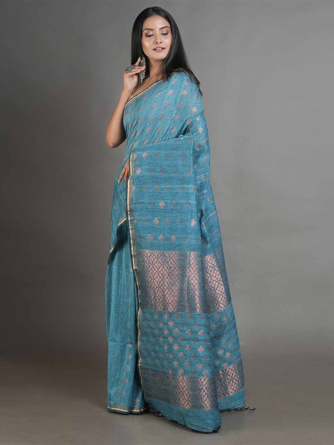 

Arhi Teal & Golden Woven Design Pure Linen Saree