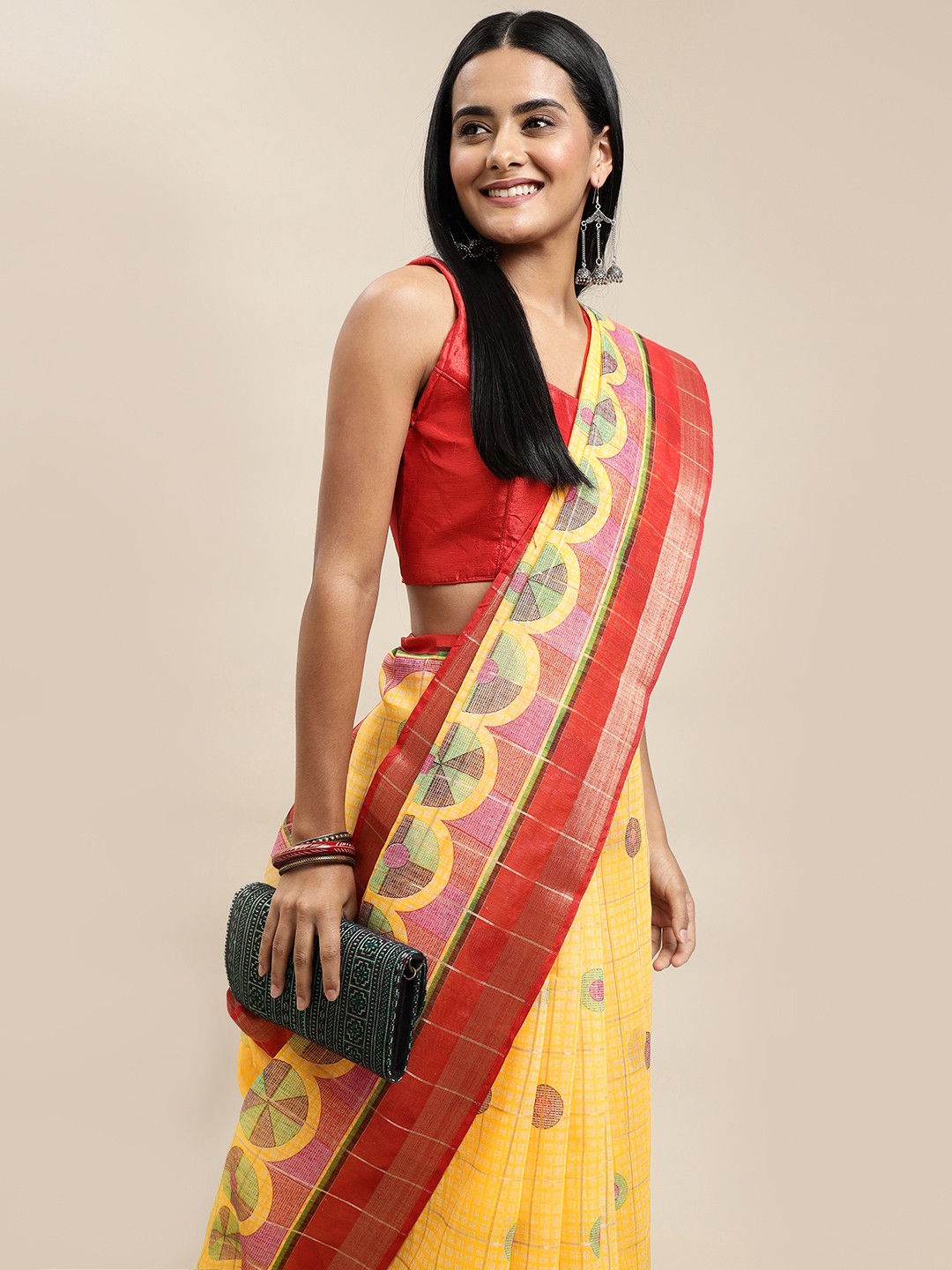 

Saree Swarg Yellow & Red Ethnic Motifs Sarees