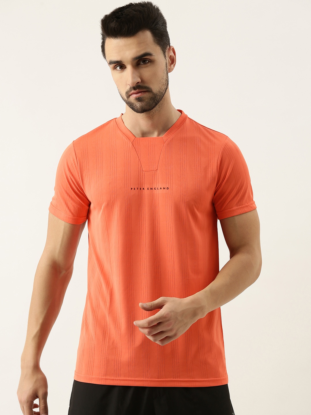 

Peter England Men Coral & Black Brand Logo Printed Slim Fit T-shirt