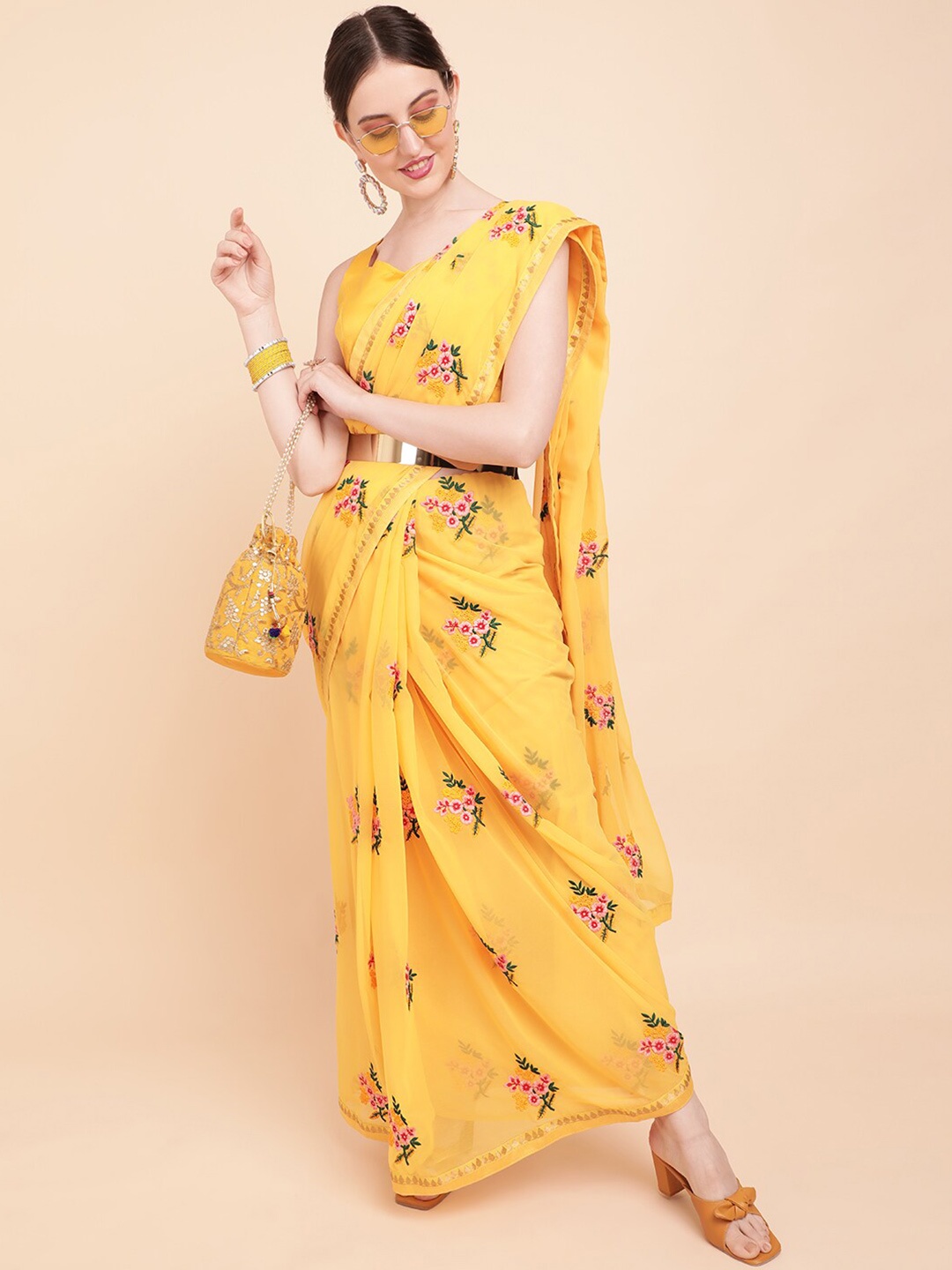 

Sangria Yellow & Pink Ethnic Motifs Embroidered Pure Georgette Saree
