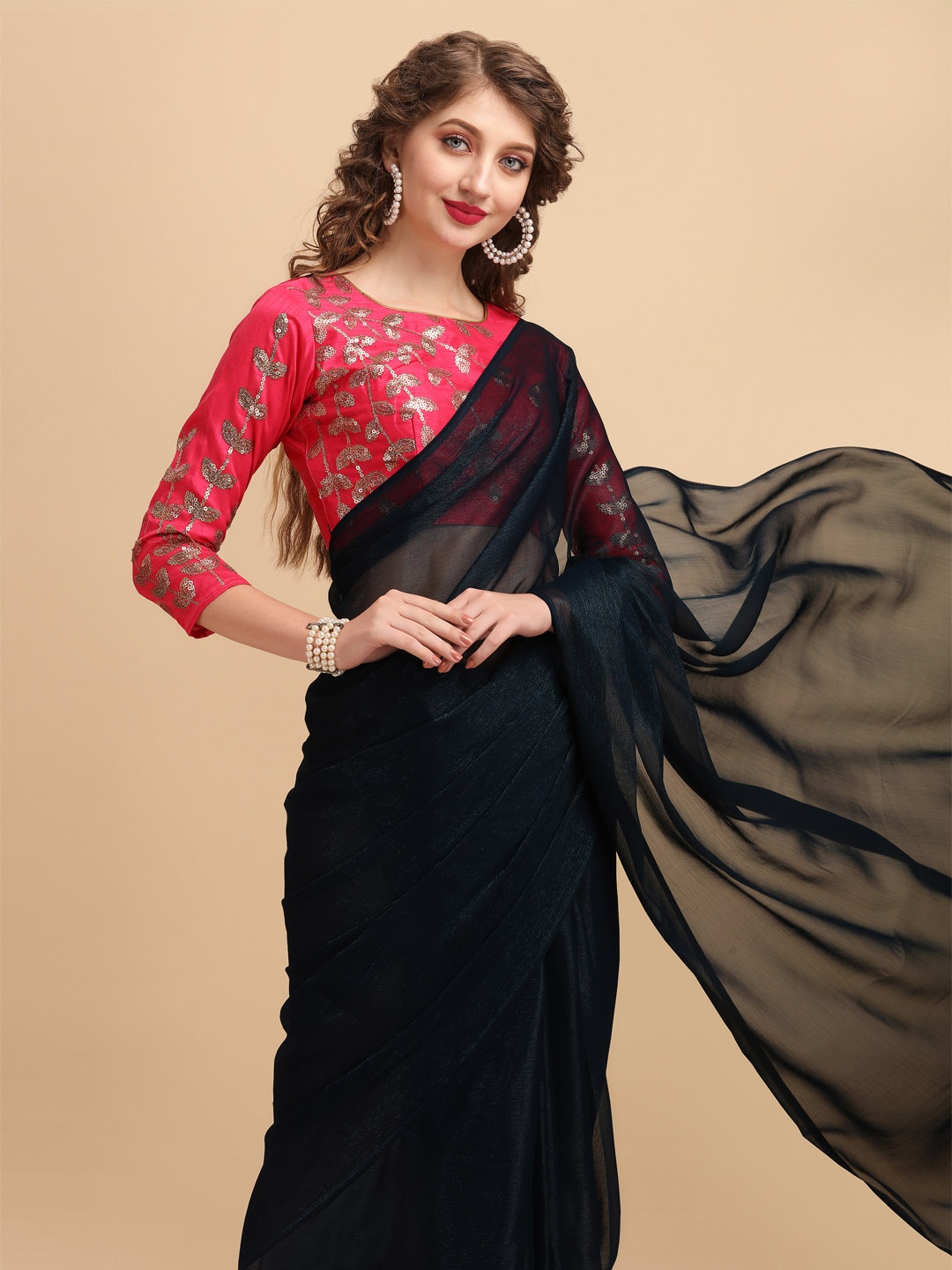 

Sangria Teal Sequinned Liva Saree