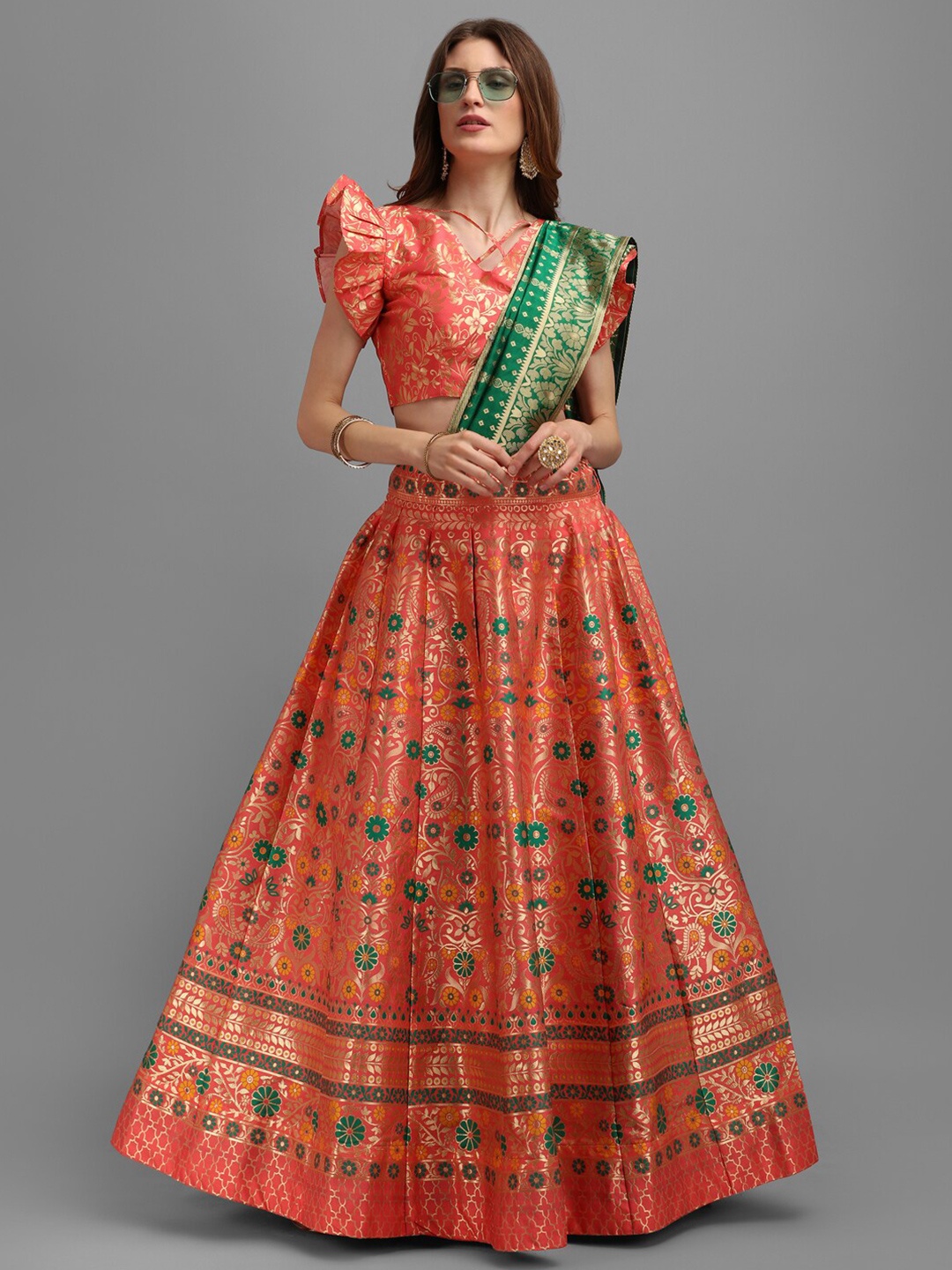 

PURVAJA Peach-Coloured & Green Semi-Stitched Lehenga & Unstitched Blouse With Dupatta