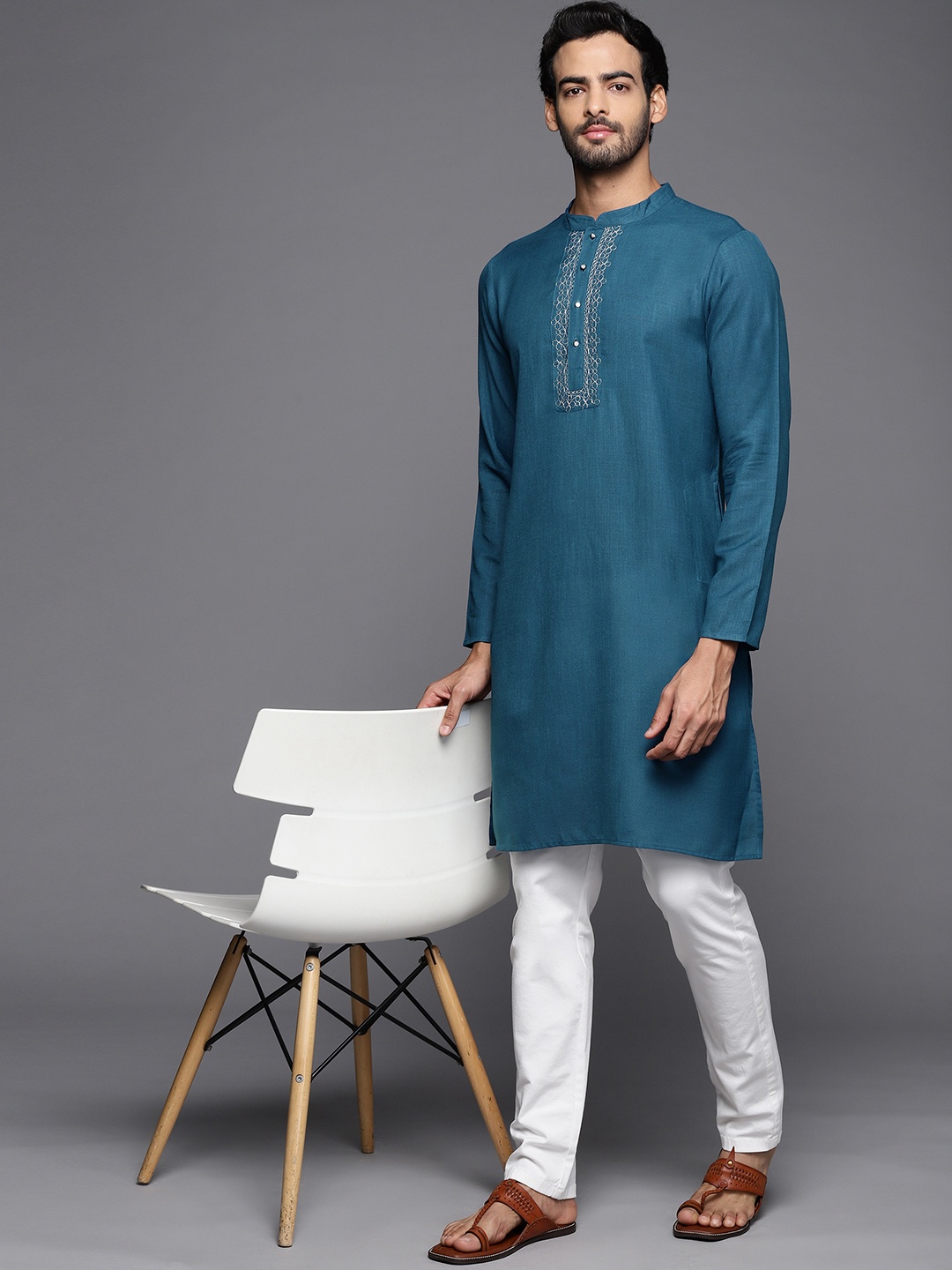 

Indo Era Men Teal Blue Pure Cotton Thread Work Solid Kurta