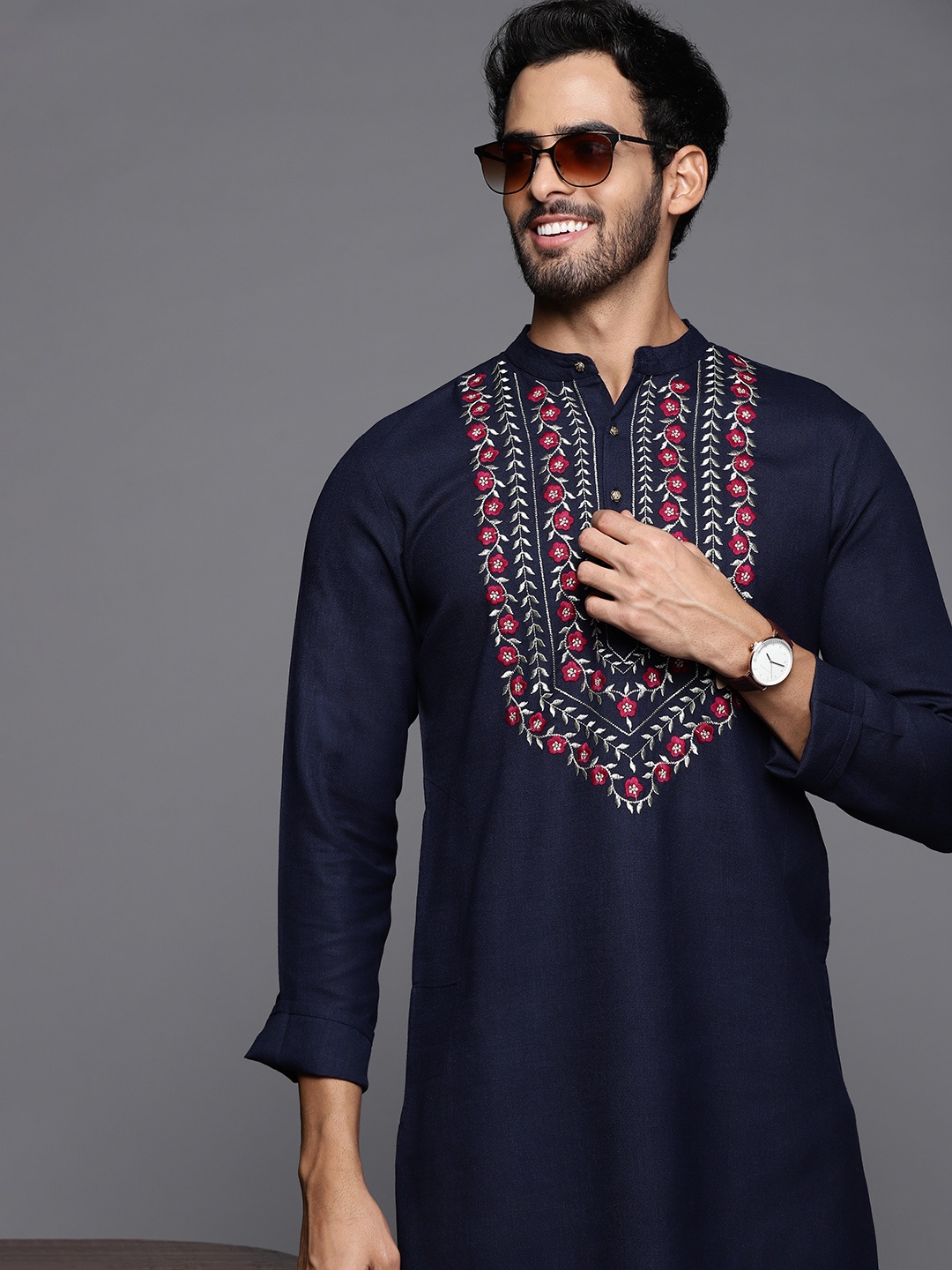 

Indo Era Men Navy Blue Floral Yoke Design Thread Work Cotton Floral Kurta