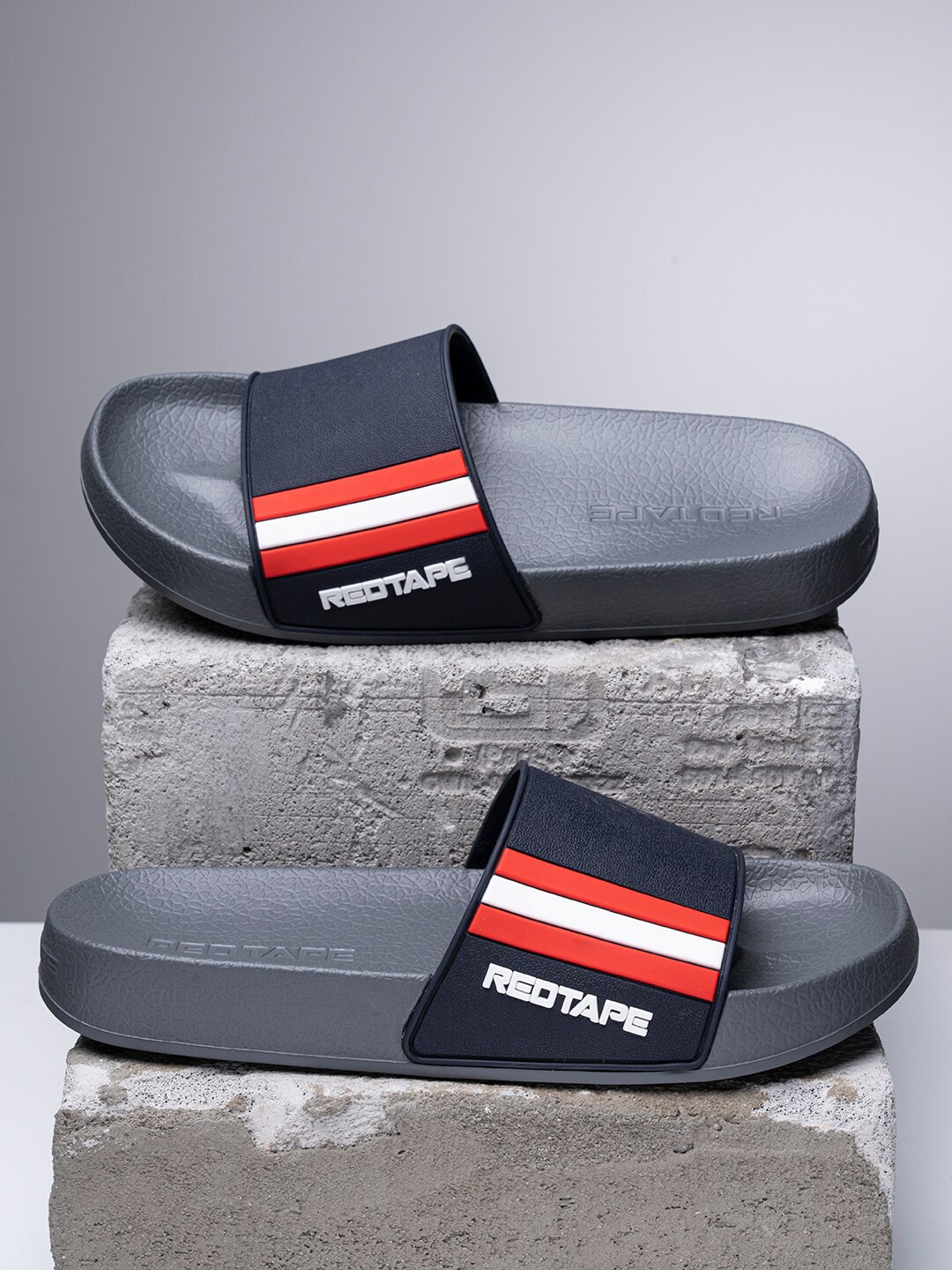 

Red Tape Men Grey & Red Striped Rubber Sliders