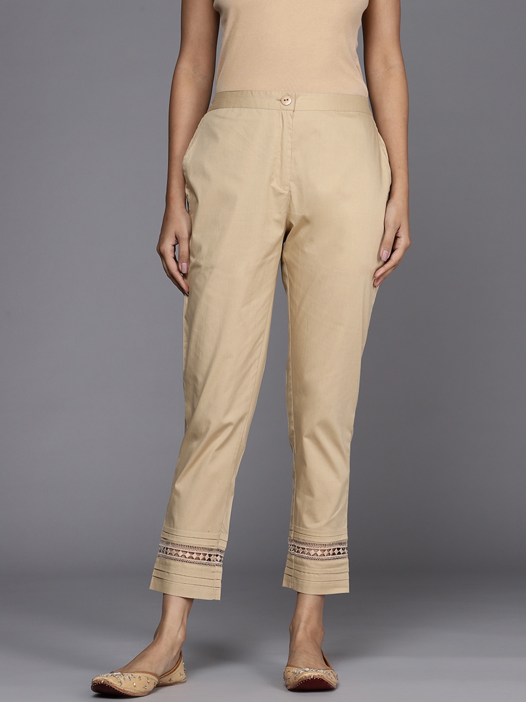 

Libas Women Beige Solid Straight Fit Pure Cotton Trousers with Lace Inserts Detail