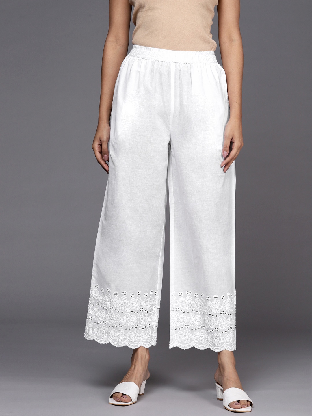 

Libas Women Off White Solid Pure Cotton Ethnic Palazzos