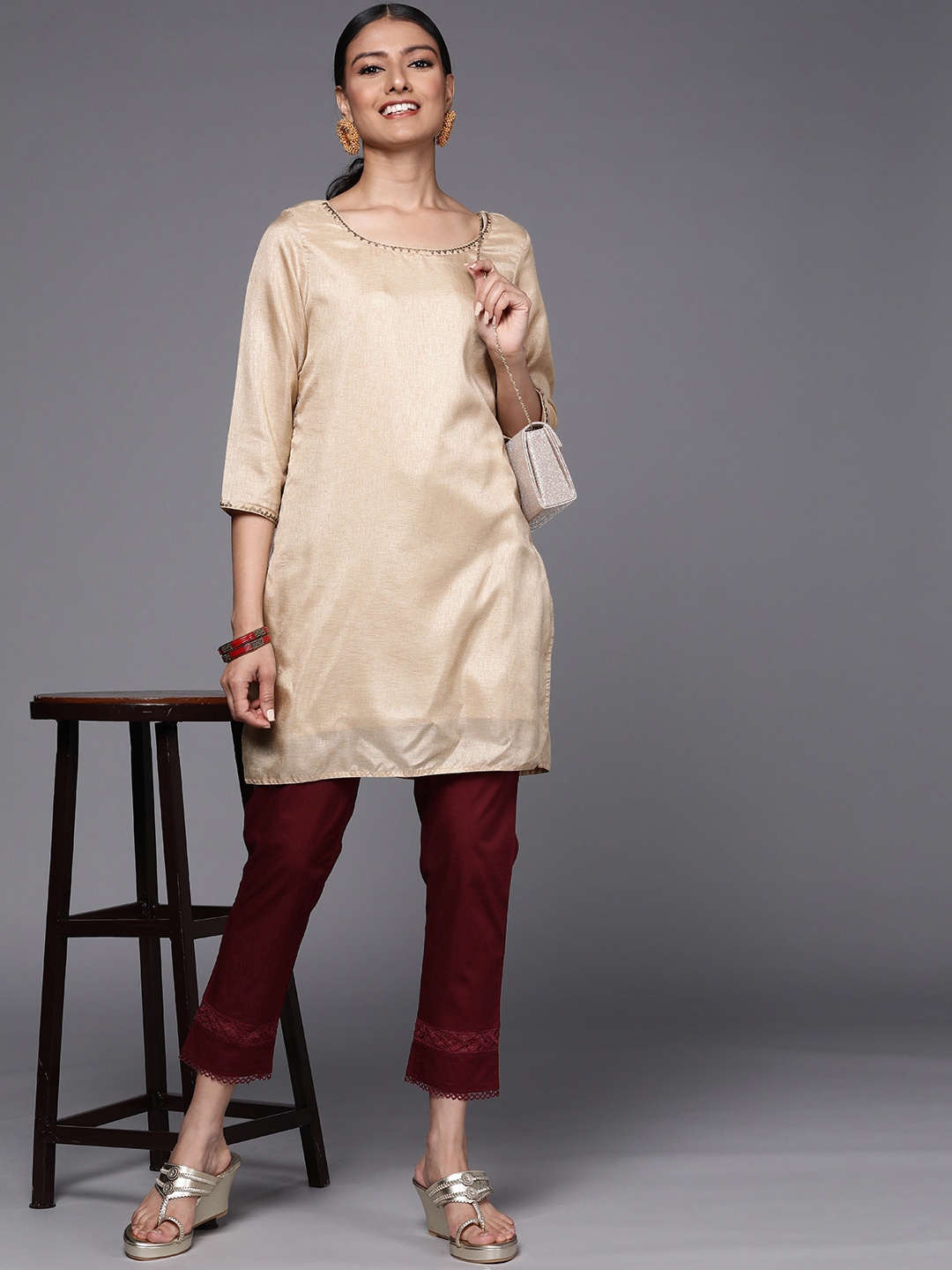 

Libas Women Maroon Pure Cotton Trousers with Lace Details at Hem