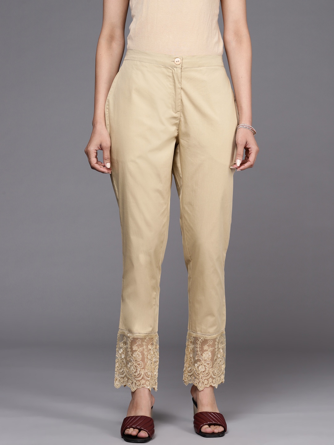 

Libas Women Beige Solid Straight Fit Pure Cotton Trousers with Lace Inserts