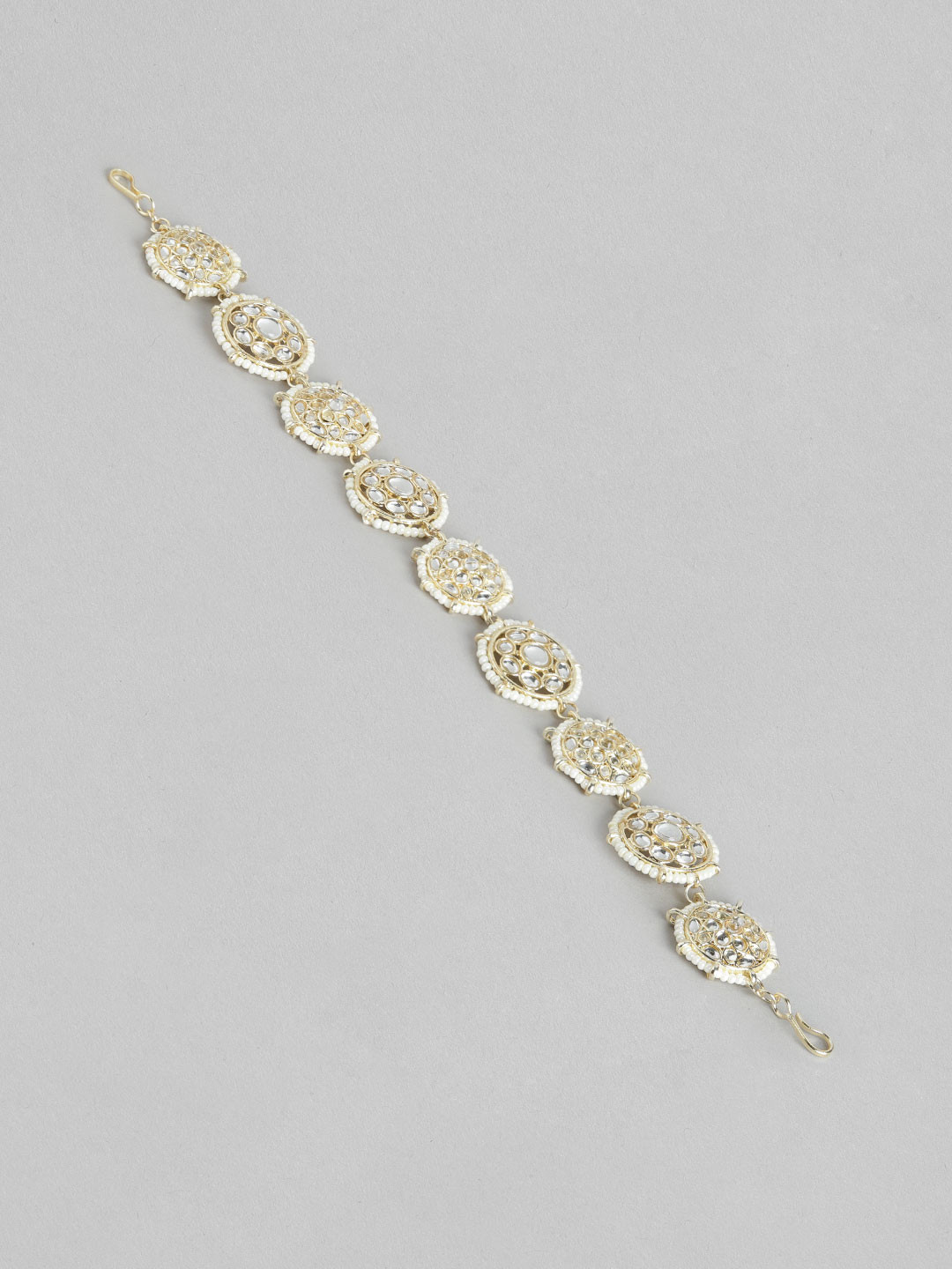 

Blueberry Gold Plated Kundan Stone Embellished Head Chain