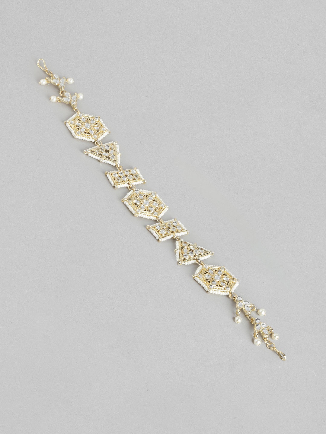 

Blueberry Gold Plated Kundan Stone Embellished Head Chain