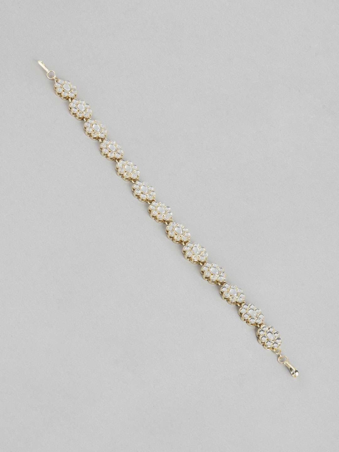 

Blueberry Gold Plated Kundan Stone Embellished Head Chain