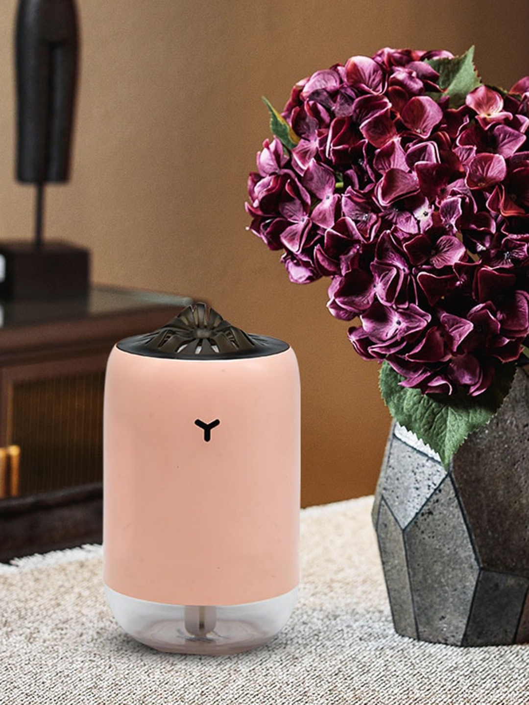

Iris Pink CELESTE Ultrasonic Aroma Diffuser
