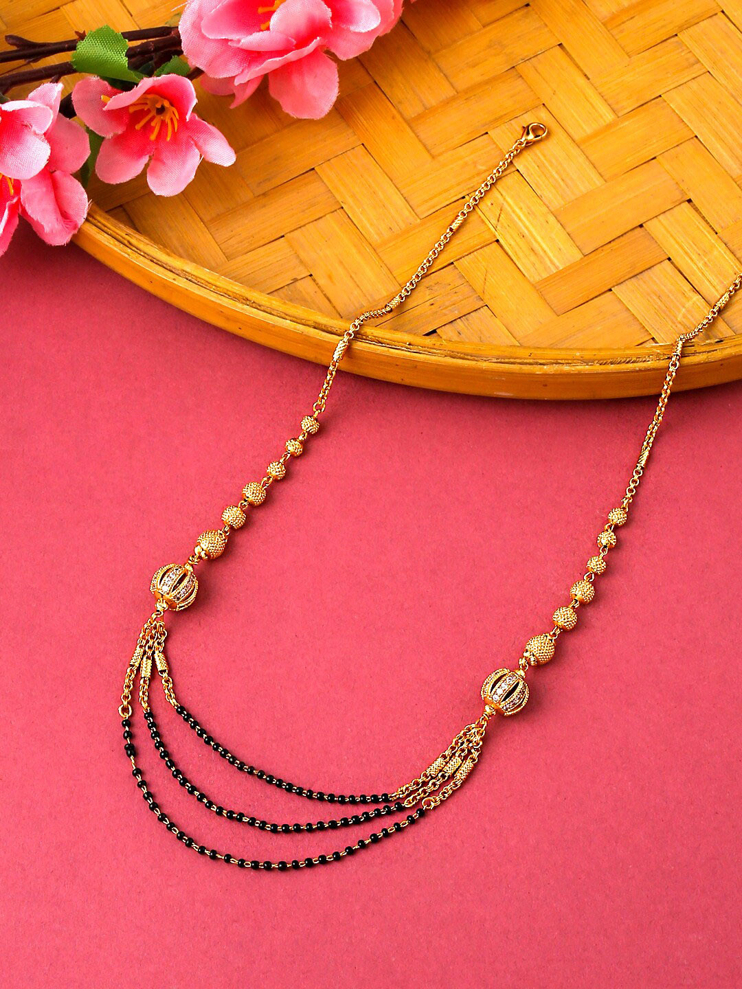 

Yellow Chimes Woman Gold Toned Crystal Studded Black Beads Mangalsutra