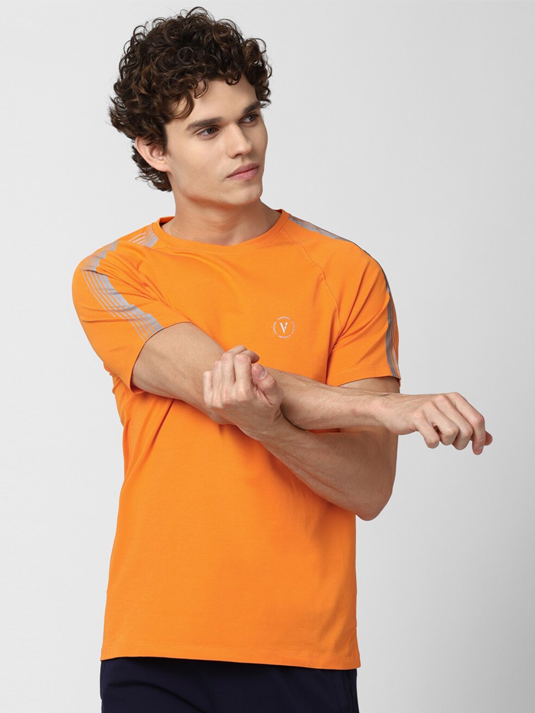 

Van Heusen Flex Men Orange Printed Slim Fit Sports T-shirt