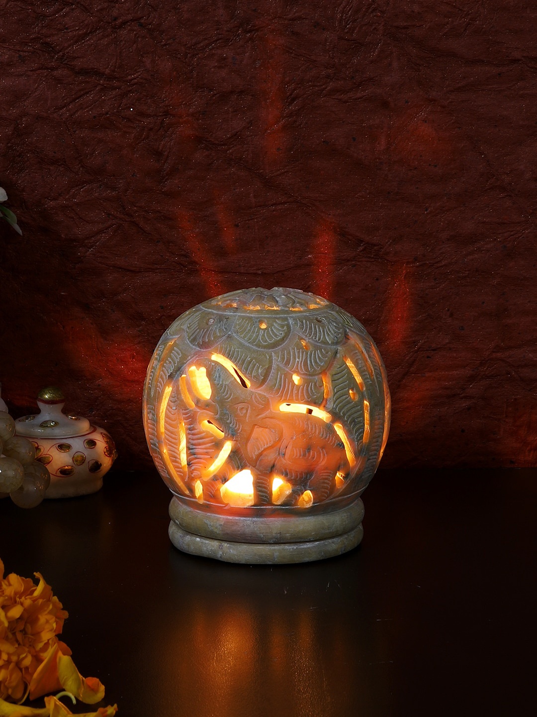 

Aapno Rajasthan Cream Elephant Cut work Stone Tealight Candle Holder