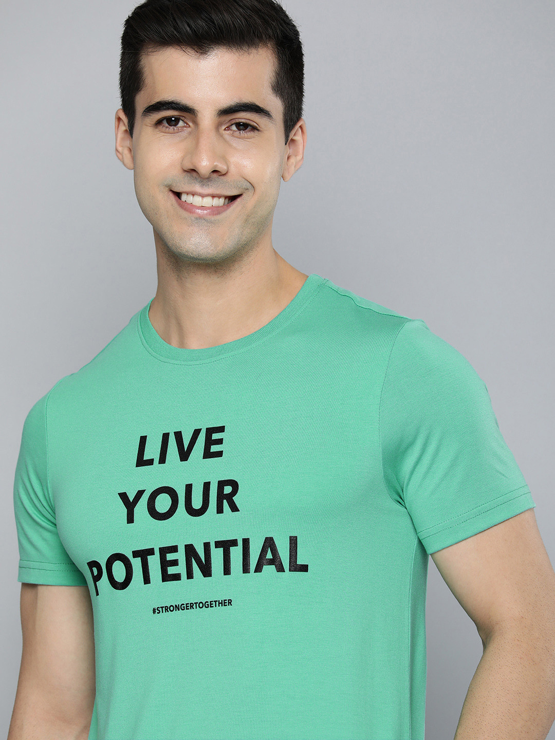 

Mast & Harbour Men Green & Black Typography Printed T-shirt