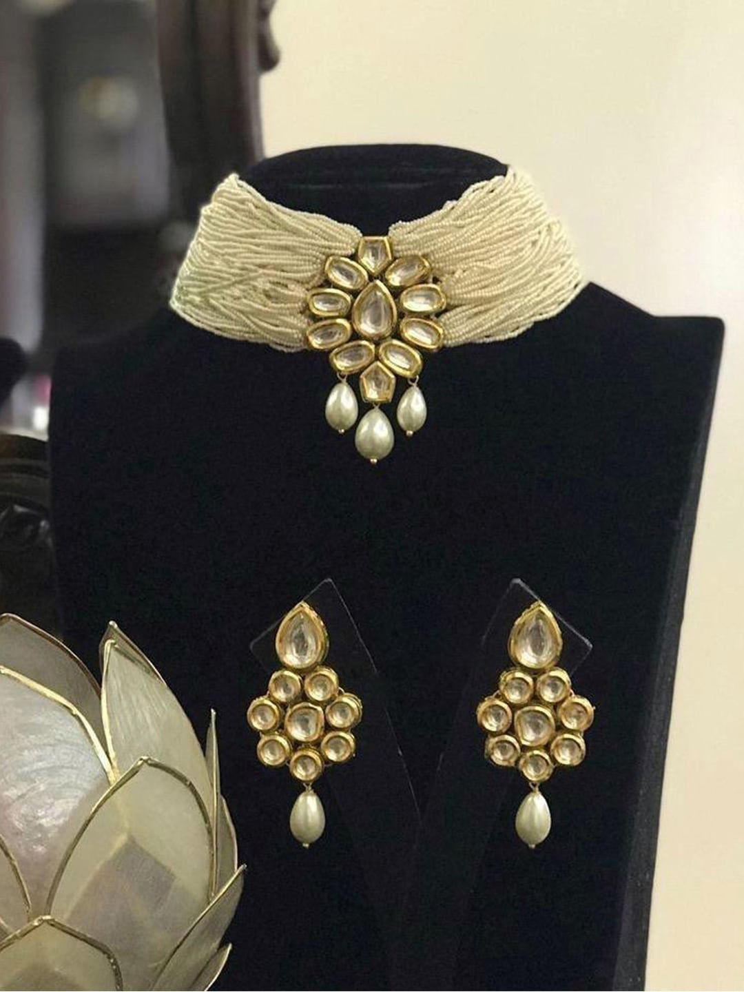 

Ishhaara Gold-Plate Off White Kundan-Studded & Pearl Beaded Jewellery Set