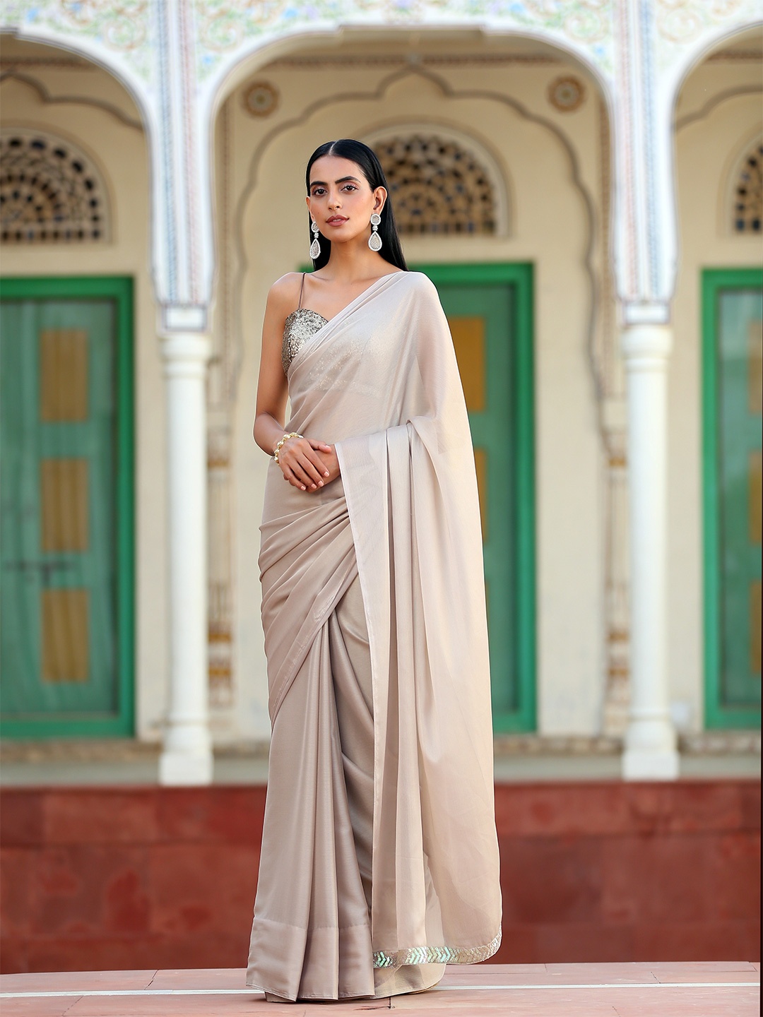 

Swtantra Cream & Silver Poly Chiffon Saree