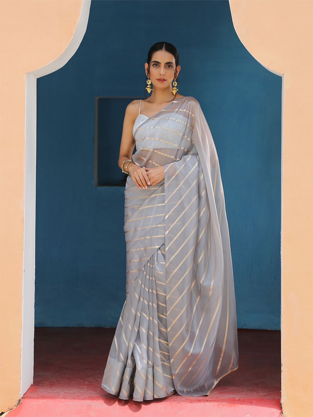 

Swtantra Grey & Gold Striped Organza Saree