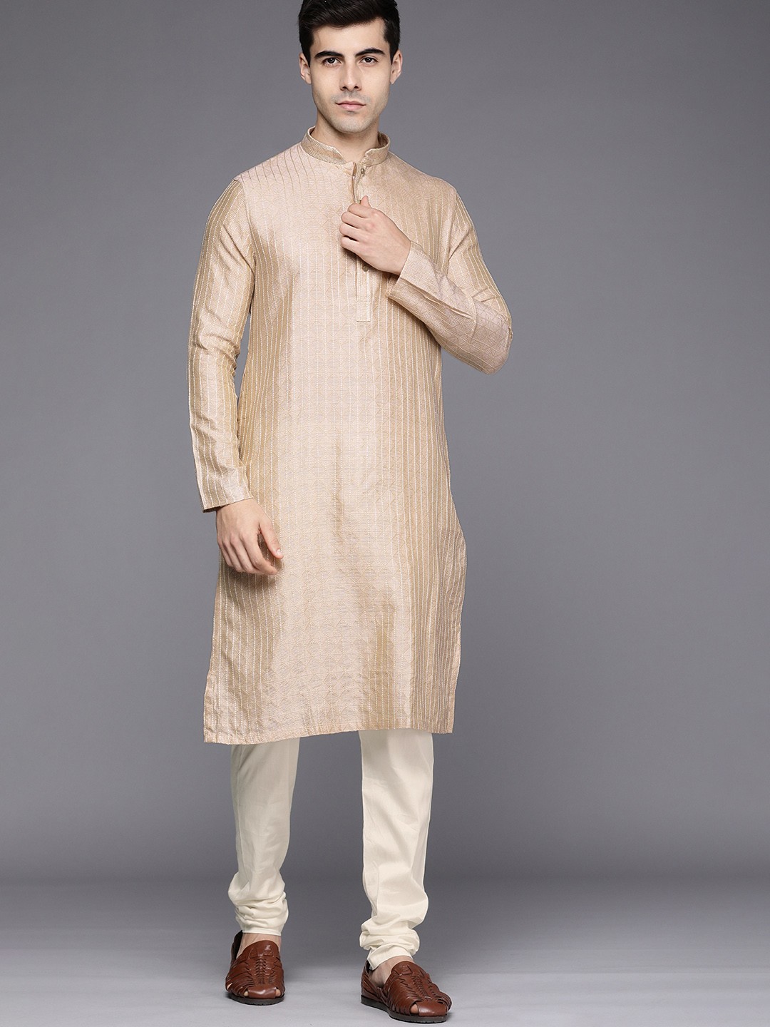 

Manyavar Men Beige Woven Design Kurta with Churidar