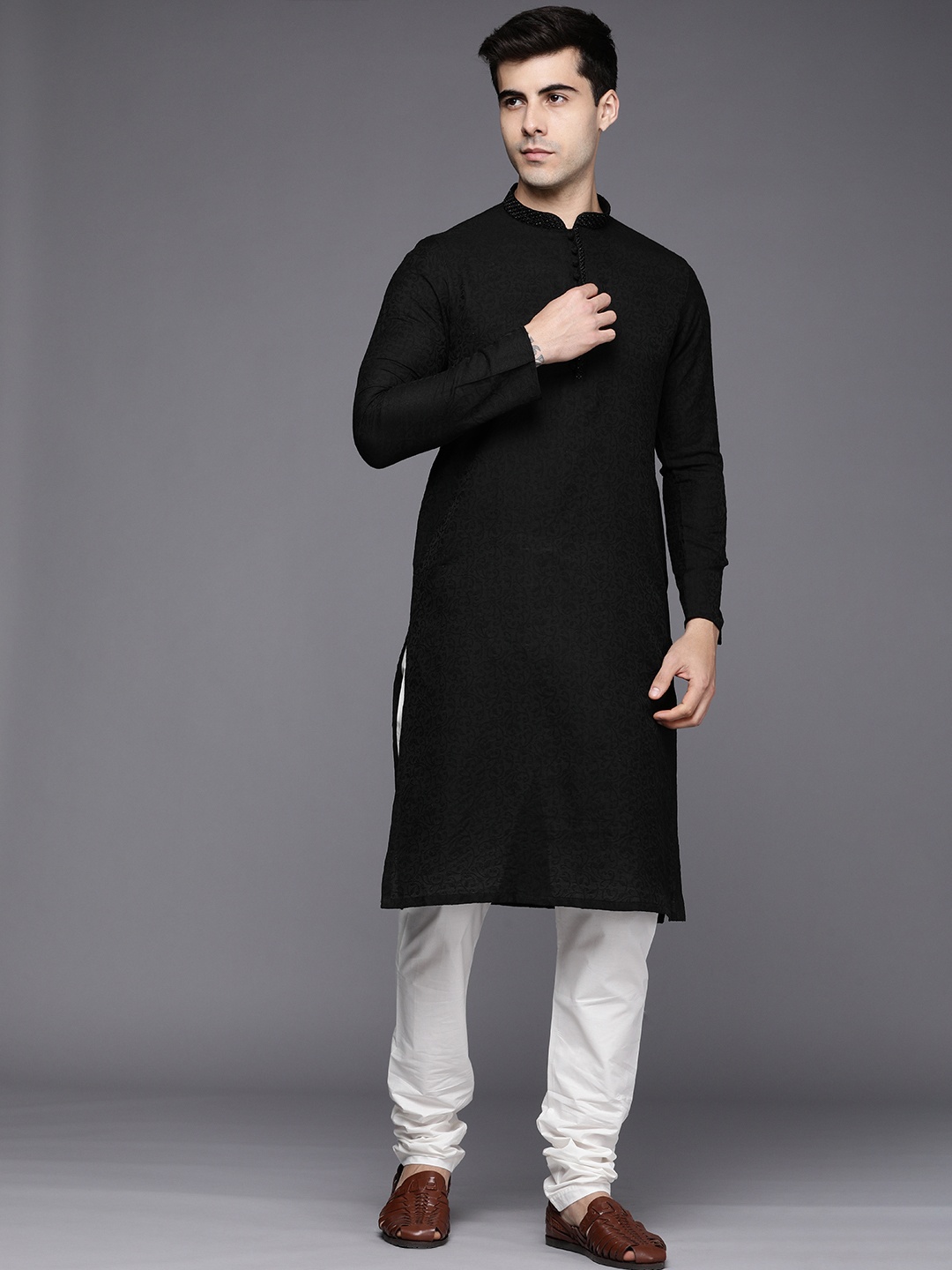 

Manyavar Men Black Floral Woven Deisgn Sequinned Kurta with Churidar