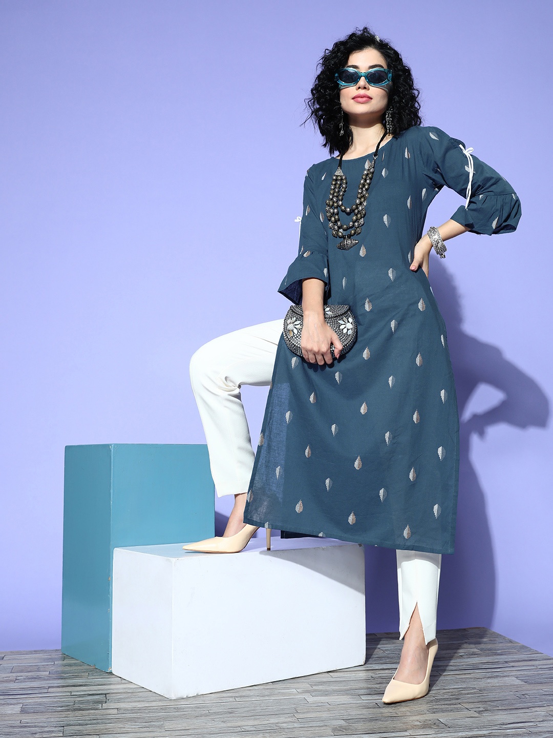 

Indo Era Women Navy Blue Chanderi Cotton Ethnic Motifs Printed Flared Sleeves Kurta