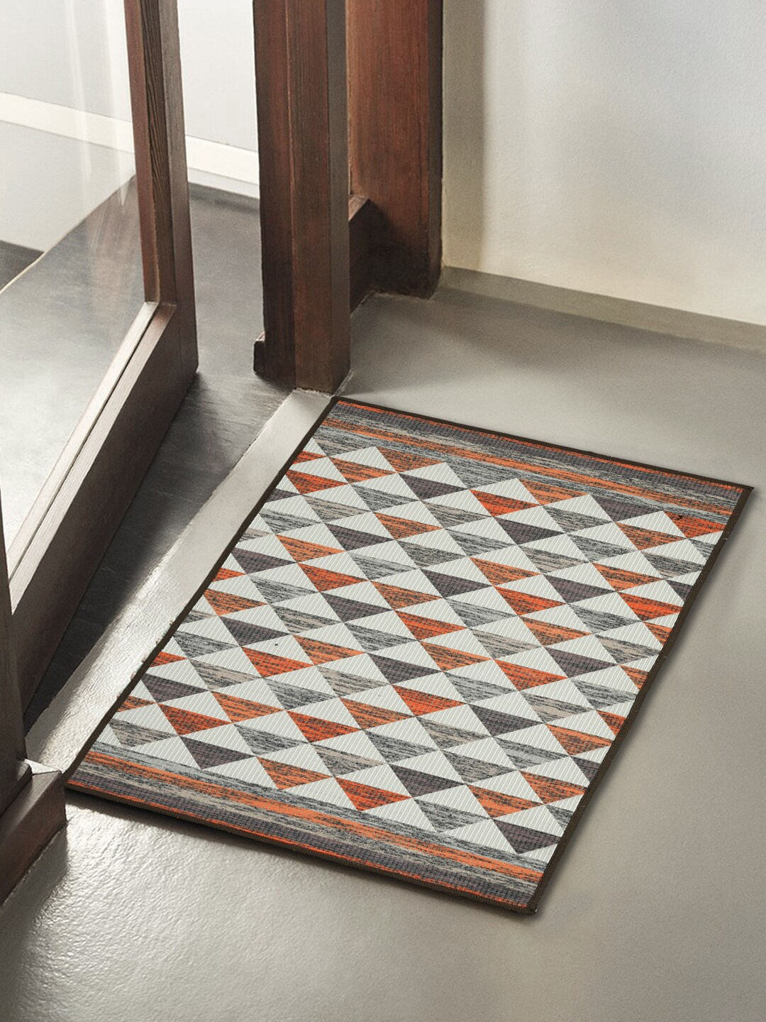 

Soumya Grey & Orange Self-Design Anti-Skid Doormat