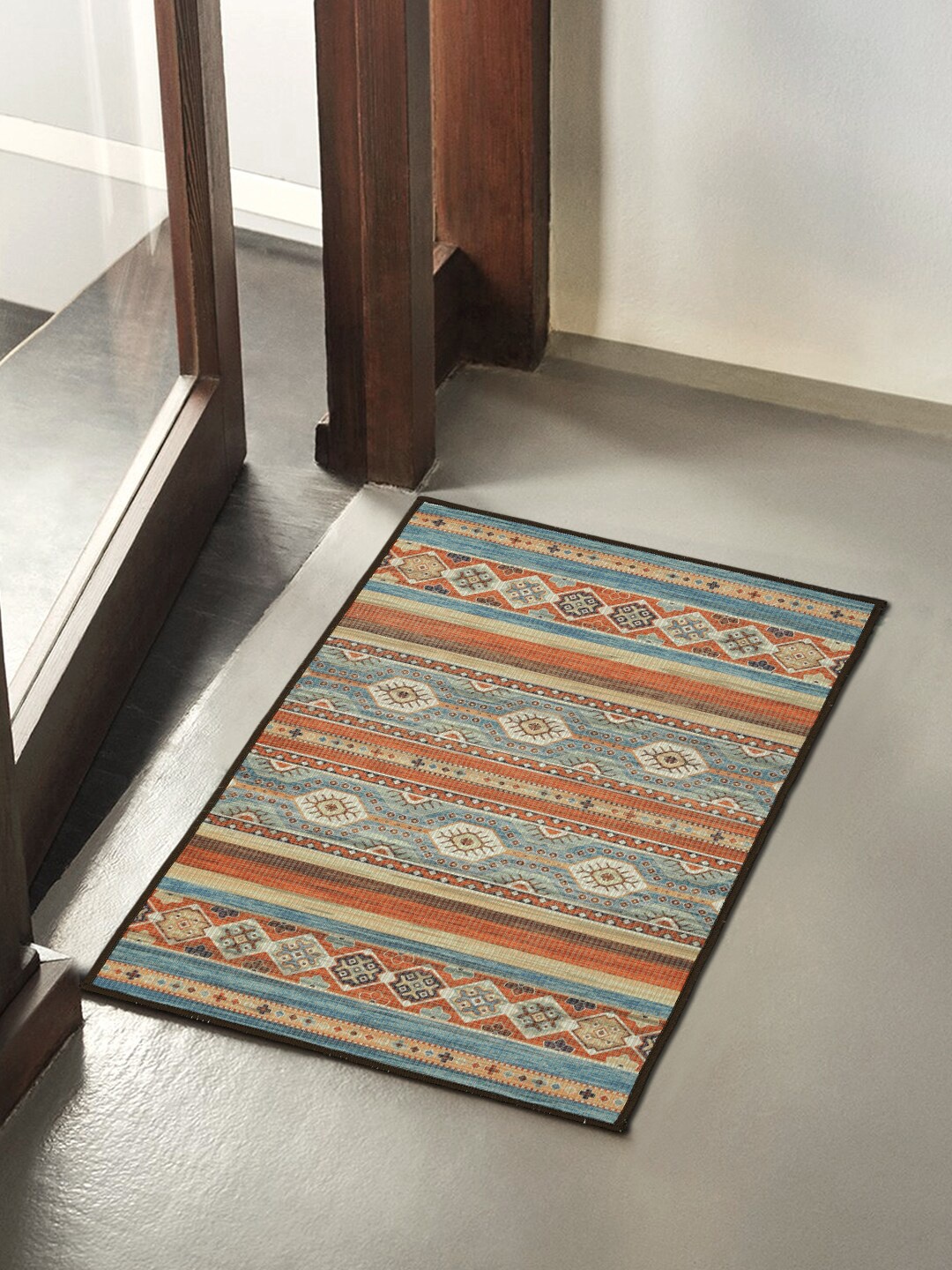 

Soumya Orange & Grey Printed Anti-Skid Doormats