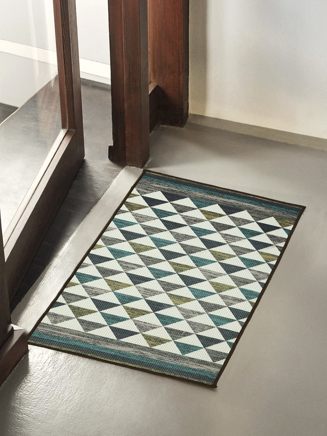 

Soumya Blue Geometric Printed Anti-Skid Doormats