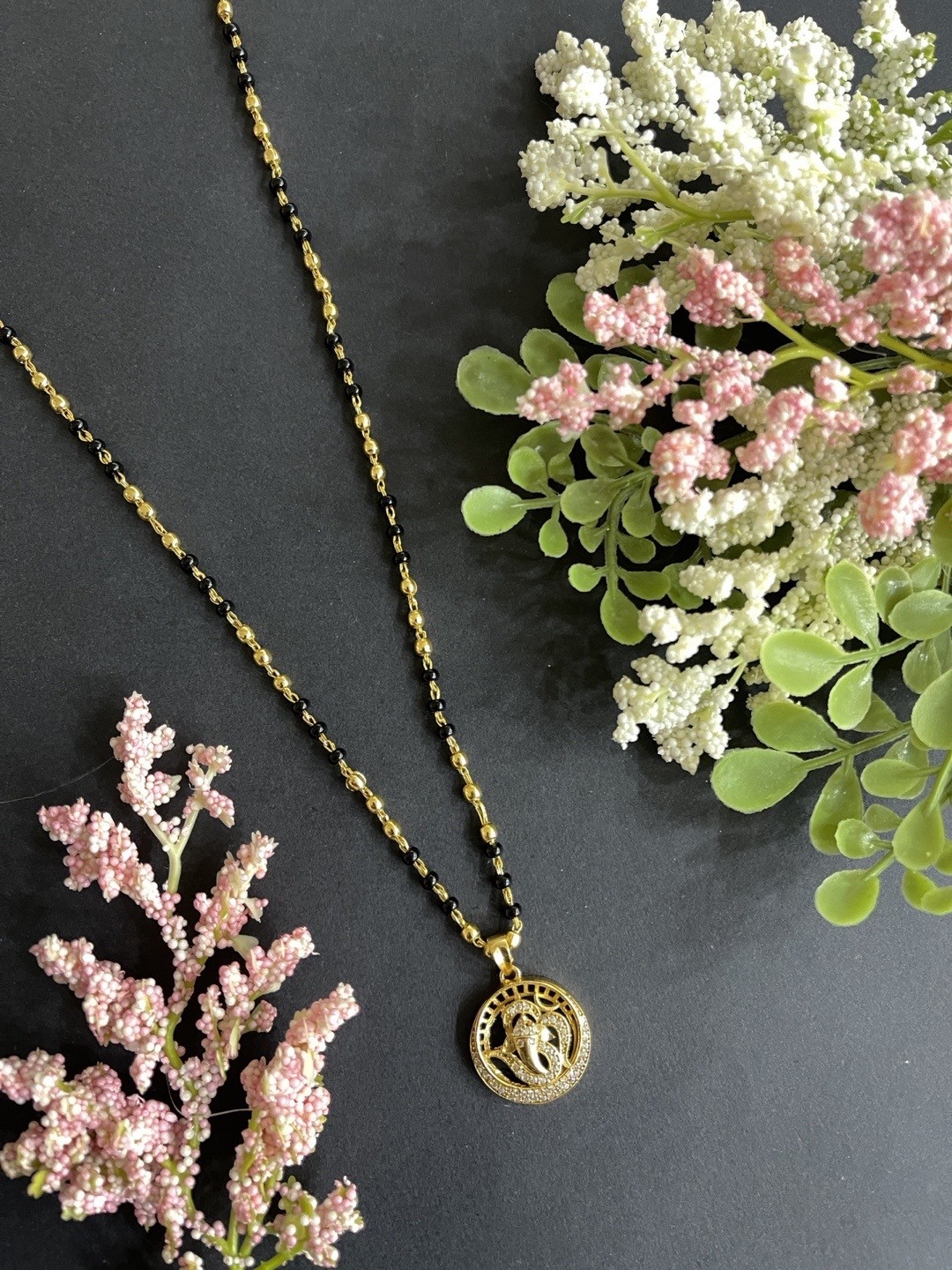 

Digital Dress Room Black Gold-Plated & White AD-Studded Mangalsutra Set