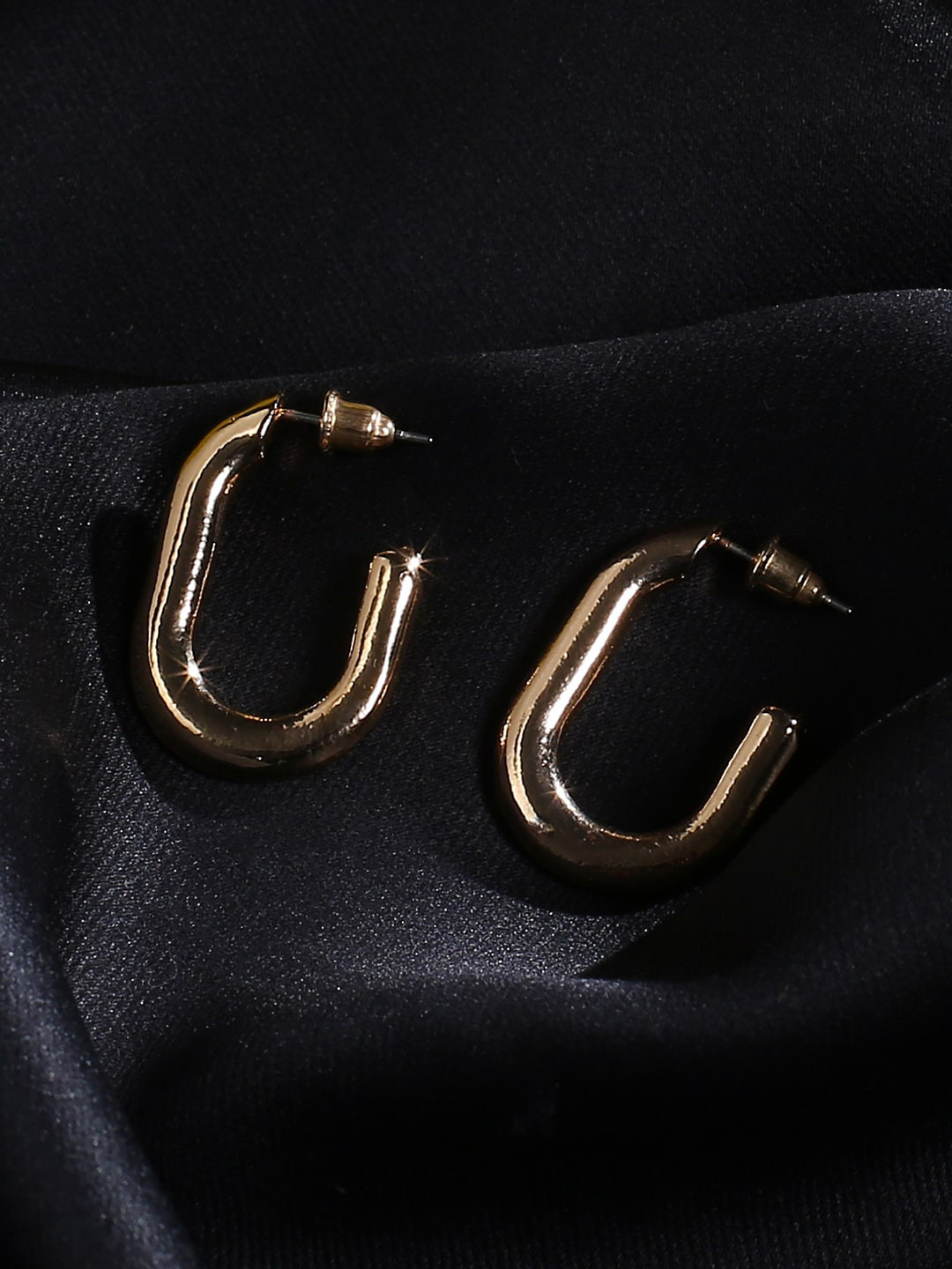 

justpeachy Gold-Toned Contemporary Half Hoop Earrings