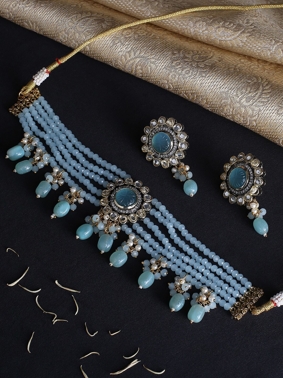 

justpeachy Women Blue Gold-Plated Jadau Artificial Stone Studded Jewellery Set