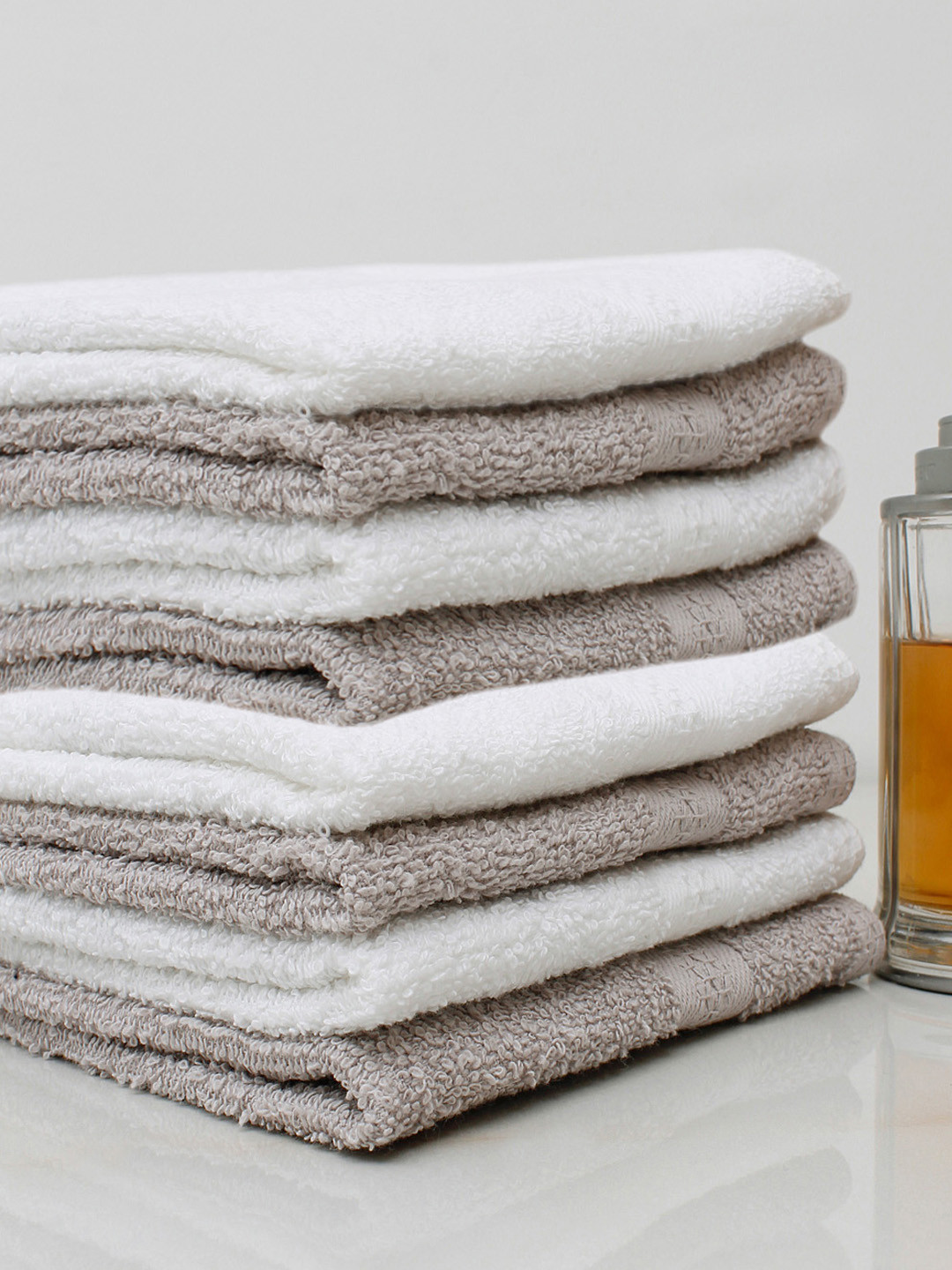 

AVI Living Pack of 8 Grey & White Anti Microbial Cotton Face Towels