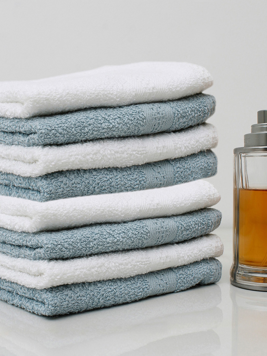 

AVI Living Set Of 8 Solid 450 GSM Pure Cotton Face Towels, Blue