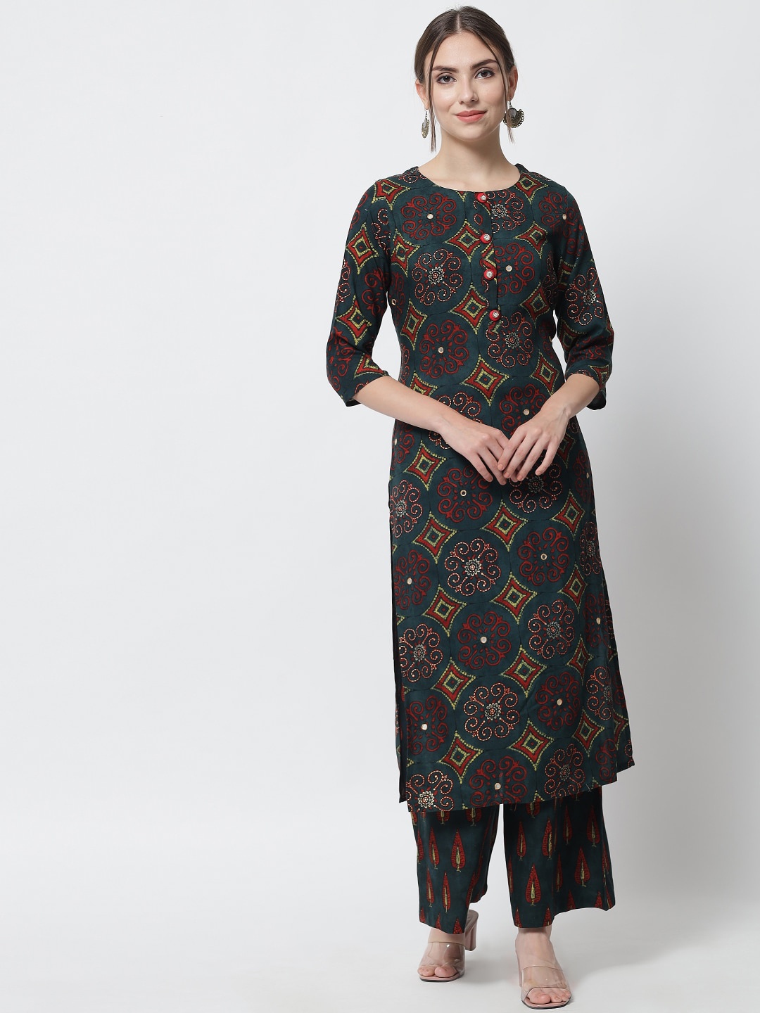 

Spera Women Green Printed Mirror Work Kurti with Palazzos