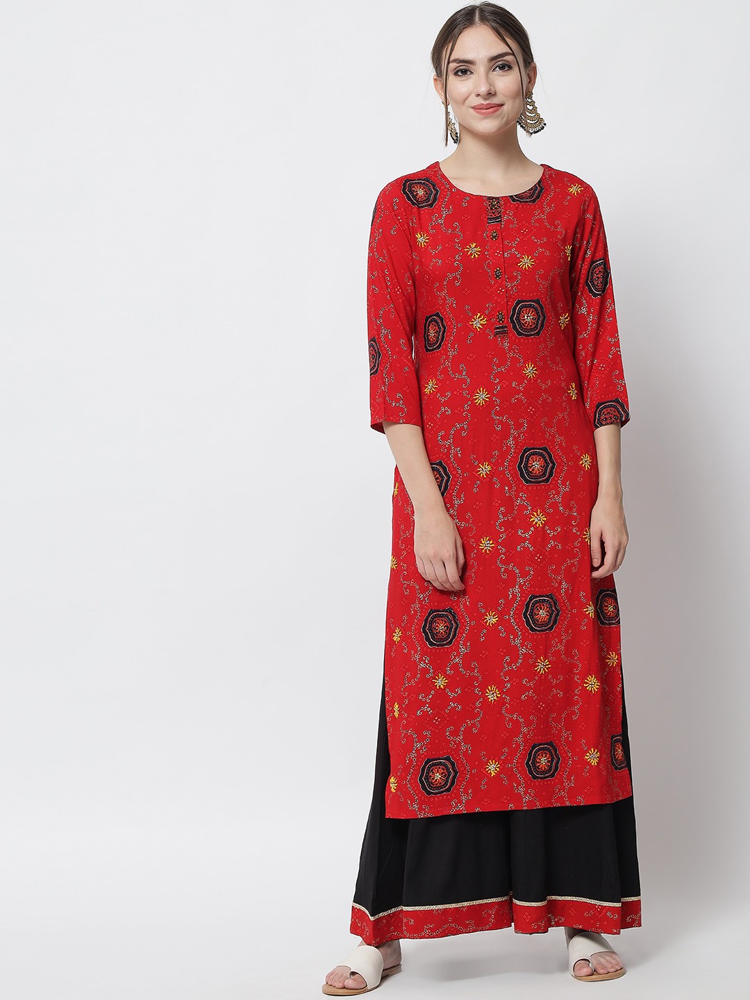 

Spera Women Red Ethnic Motifs Embroidered Kurta with Palazzos