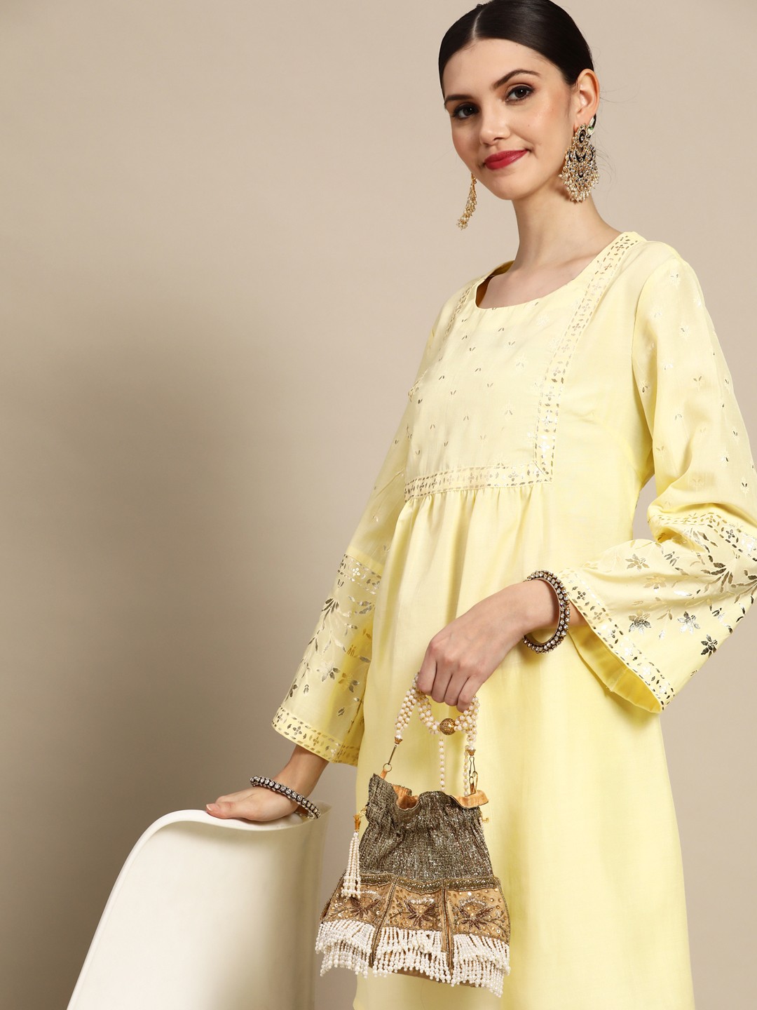 

Anouk Women Yellow Ethnic Motifs Yoke Design Pleated A-Line Kurta with Trousers