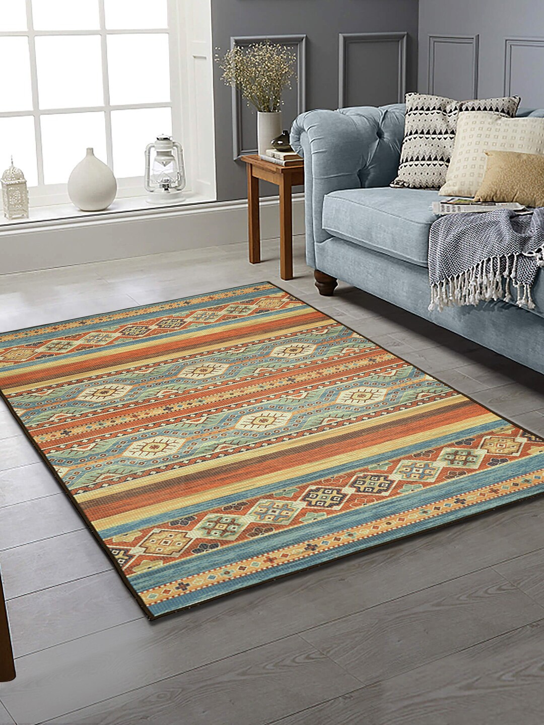 

Soumya Orange & Grey Printed Anti-Skid Carpet