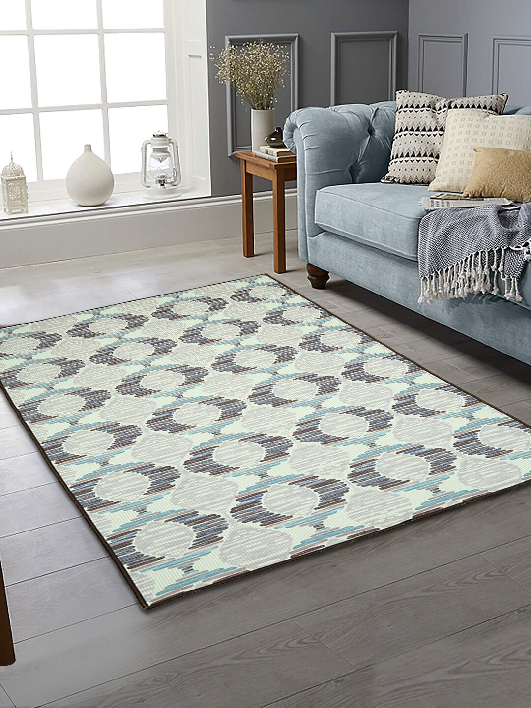 

Soumya Grey & Blue Printed Anti-skid Rectangular Carpets