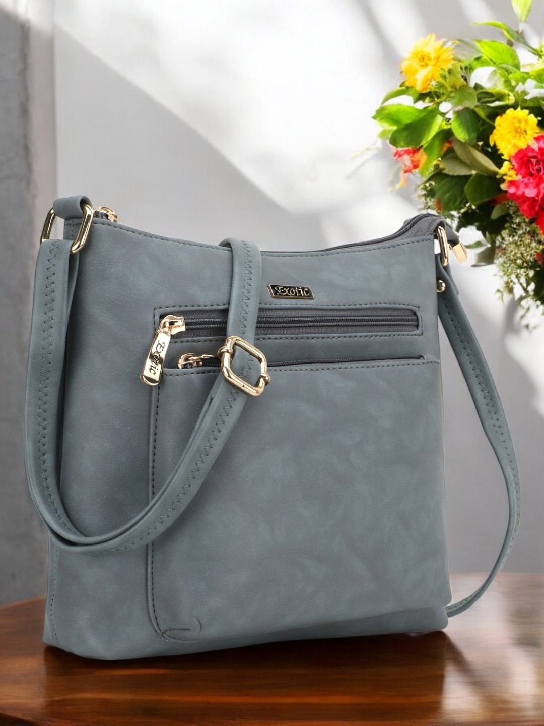 

Exotic Grey PU Swagger Sling Bag