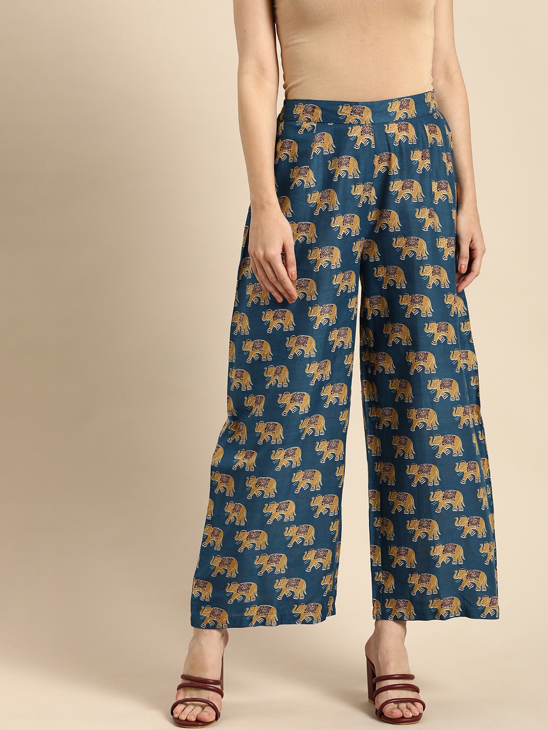 

Anouk Women Teal Blue & Beige Ethnic Motifs Printed Pure Cotton Ethnic Palazzos