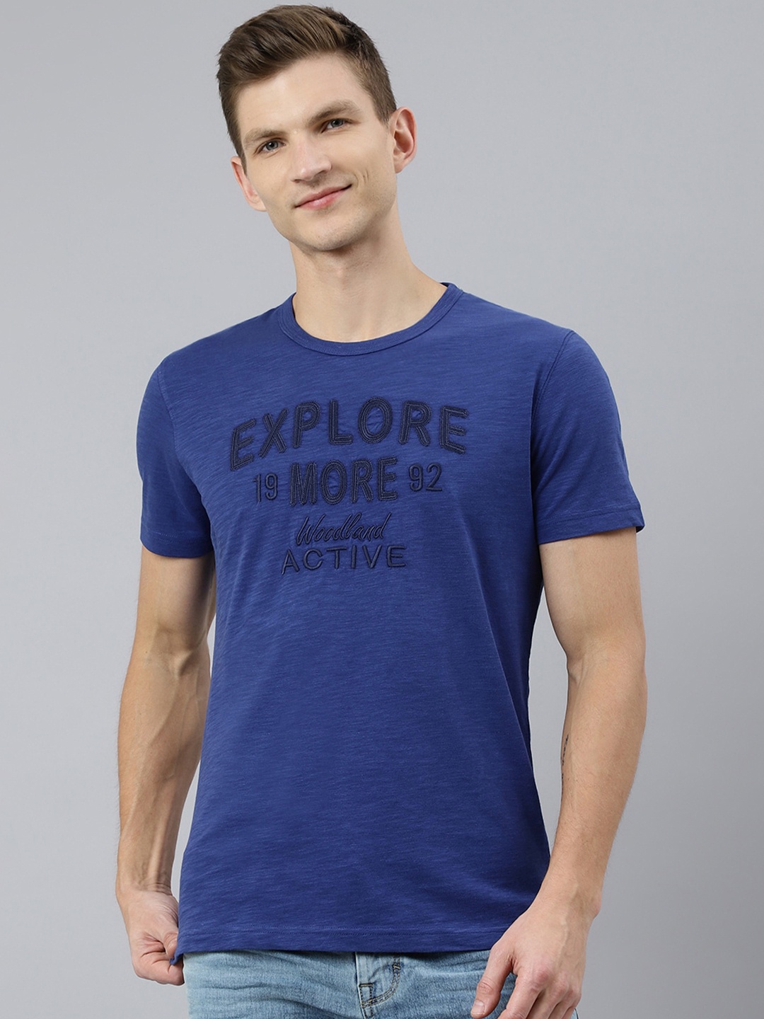 

Woodland Men Blue Typography Printed Raw Edge T-shirt