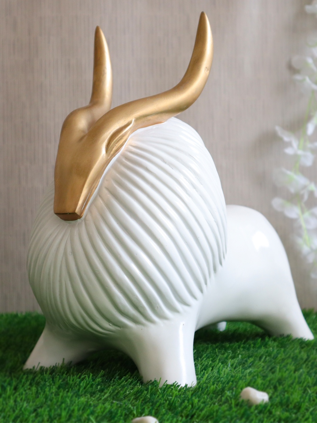 

TIED RIBBONS White & Gold-Toned Polyresin Yak Statue Showpiece