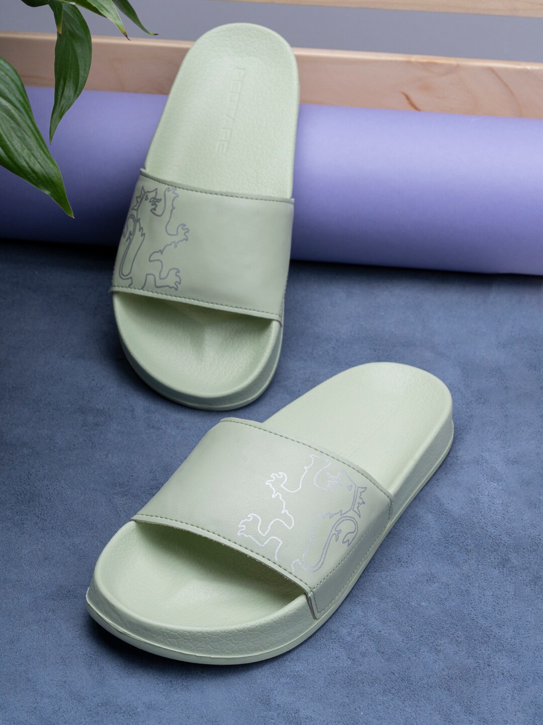 

Red Tape Women Green Printed Rubber Sliders