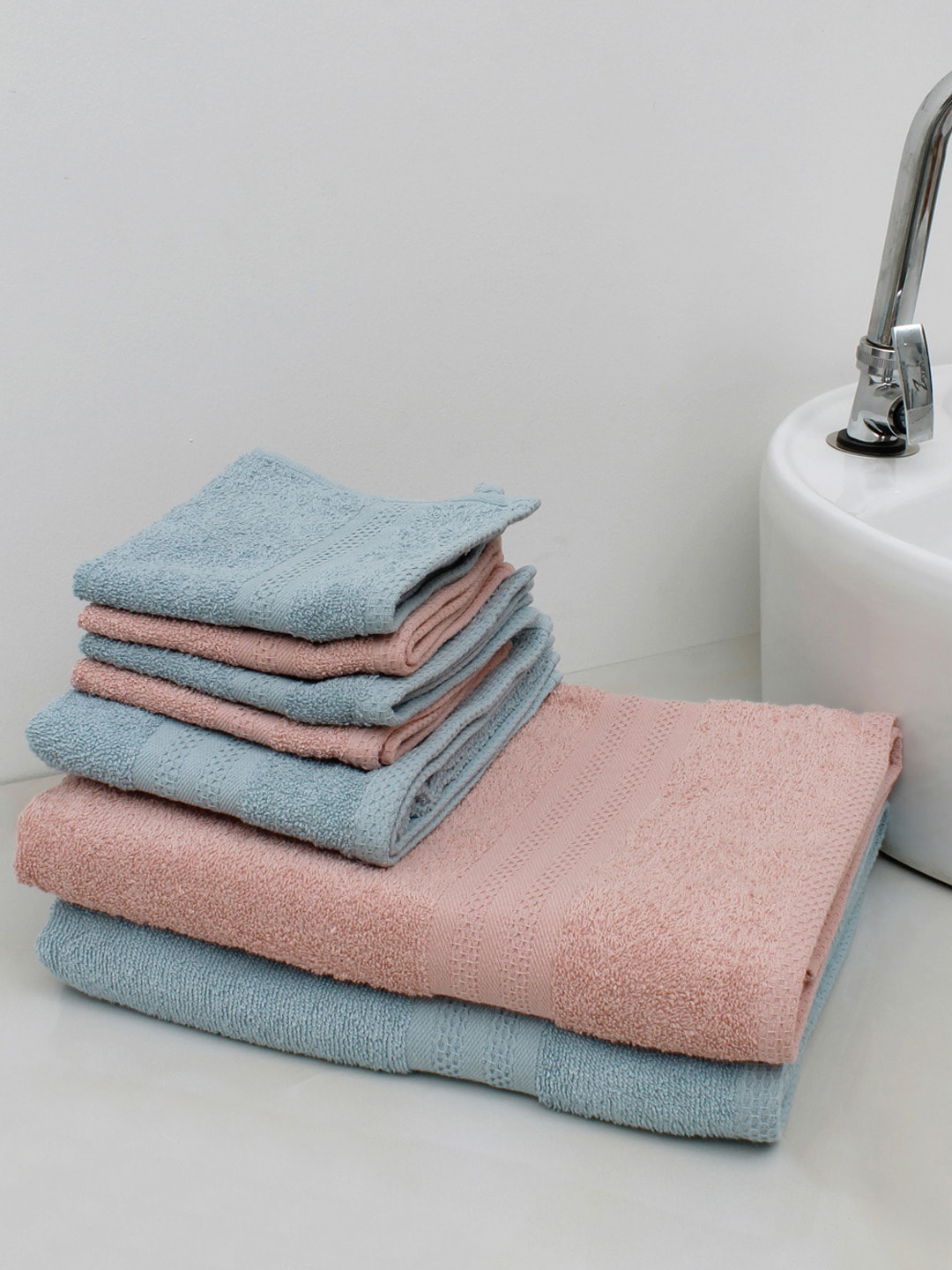 

AVI Living Set of 8 Blue & Peach coloured Solid 400 GSM Cotton Towels