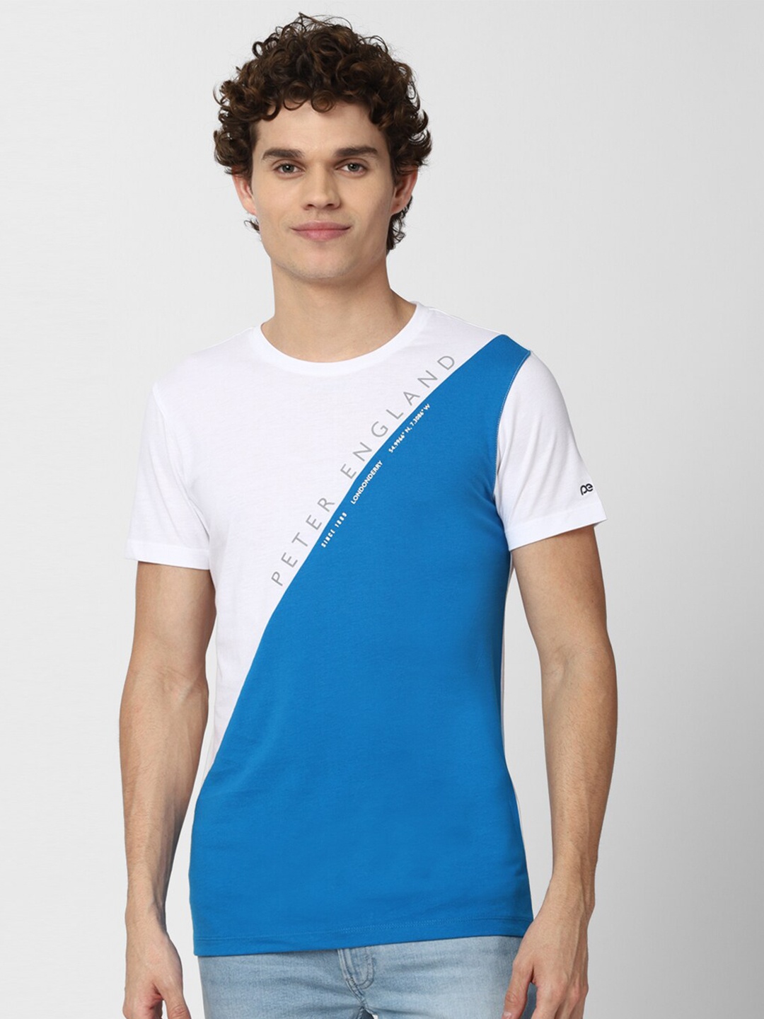

Peter England Casuals Men White Colourblocked Slim Fit T-shirt